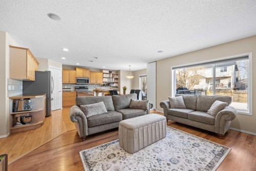 83 Cougarstone Way Sw, Calgary, AB - Indoor Photo Showing Living Room