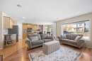 83 Cougarstone Way Sw, Calgary, AB  - Indoor Photo Showing Living Room 