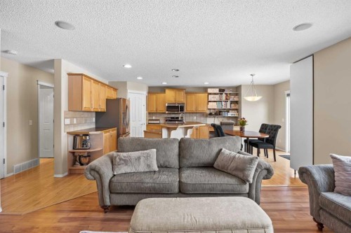 83 Cougarstone Way Sw, Calgary, AB - Indoor Photo Showing Living Room