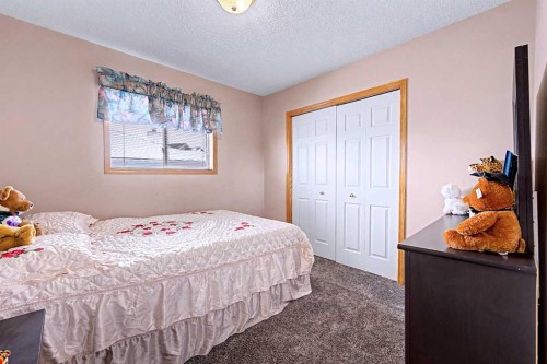 433 Coral Springs Place Ne, Calgary, AB - Indoor Photo Showing Bedroom