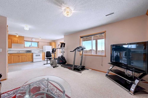 433 Coral Springs Place Ne, Calgary, AB - Indoor Photo Showing Gym Room