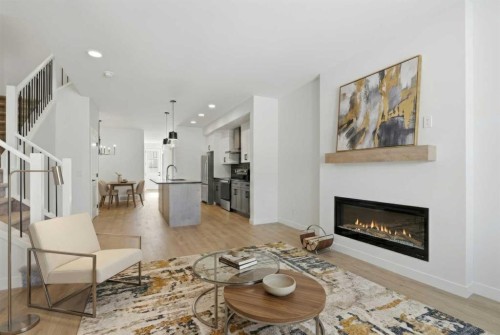 35 Belvedere Crescent Se, Calgary, AB - Indoor Photo Showing Living Room With Fireplace