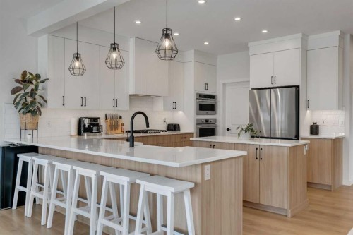 52 Sugarsnap Way Se, Calgary, AB - Indoor Photo Showing Kitchen With Upgraded Kitchen