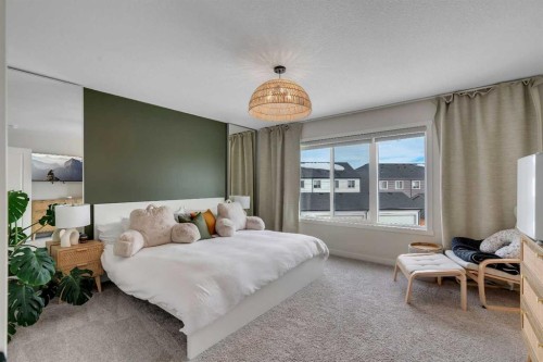 52 Sugarsnap Way Se, Calgary, AB - Indoor Photo Showing Bedroom