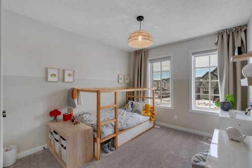 52 Sugarsnap Way Se, Calgary, AB - Indoor Photo Showing Bedroom