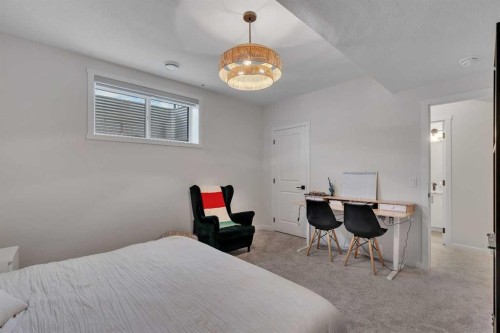 52 Sugarsnap Way Se, Calgary, AB - Indoor Photo Showing Bedroom