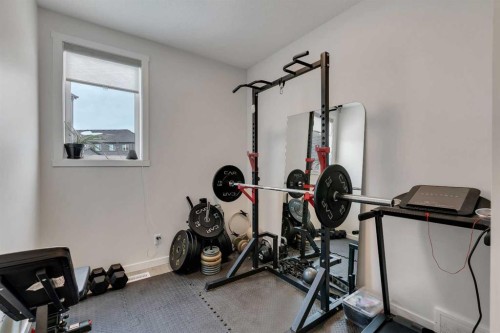 52 Sugarsnap Way Se, Calgary, AB - Indoor Photo Showing Gym Room