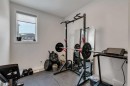 52 Sugarsnap Way Se, Calgary, AB  - Indoor Photo Showing Gym Room 