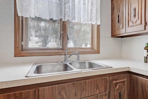 13 Hawthorne Crescent Nw, Calgary, AB - Indoor Photo Showing Kitchen With Double Sink