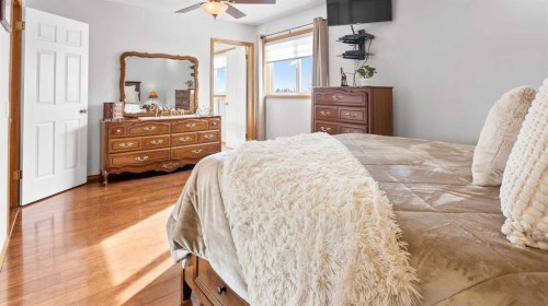 323 Mt Cornwall Circle Se, Calgary, AB - Indoor Photo Showing Bedroom