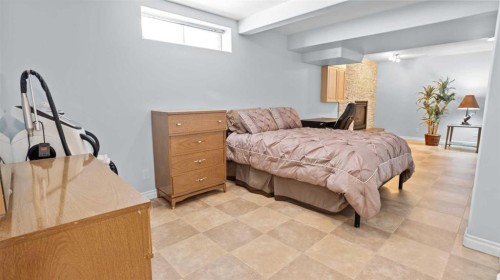323 Mt Cornwall Circle Se, Calgary, AB - Indoor Photo Showing Bedroom