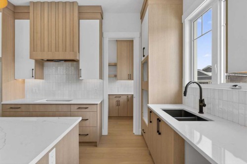 32 Lakes Estates Circle, Strathmore, AB - Indoor Photo Showing Kitchen With Double Sink