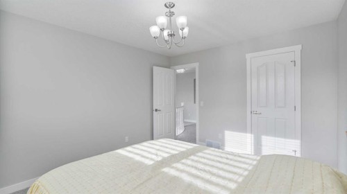 39 Mt Douglas Point Se, Calgary, AB - Indoor Photo Showing Bedroom