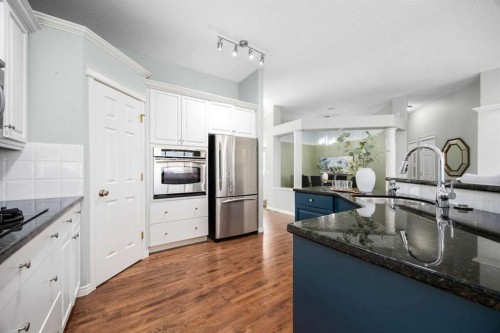 118 Eagleview Heights, Cochrane, AB - Indoor Photo Showing Kitchen With Stainless Steel Kitchen With Upgraded Kitchen