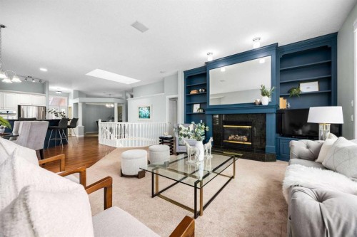 118 Eagleview Heights, Cochrane, AB - Indoor Photo Showing Living Room With Fireplace