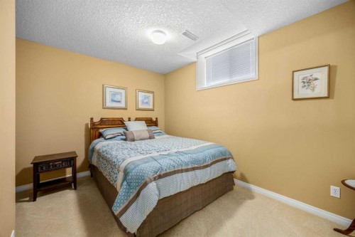 118 Eagleview Heights, Cochrane, AB - Indoor Photo Showing Bedroom