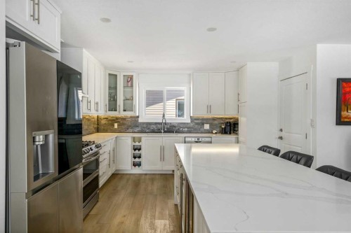 119 Silvercreek Close Nw, Calgary, AB - Indoor Photo Showing Kitchen With Upgraded Kitchen