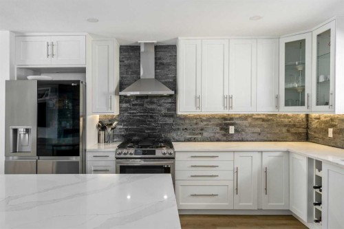 119 Silvercreek Close Nw, Calgary, AB - Indoor Photo Showing Kitchen With Upgraded Kitchen