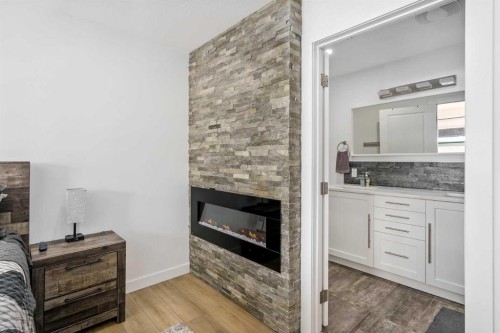 119 Silvercreek Close Nw, Calgary, AB - Indoor With Fireplace