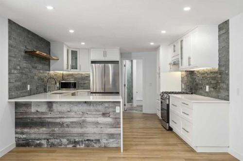 119 Silvercreek Close Nw, Calgary, AB - Indoor Photo Showing Kitchen With Upgraded Kitchen