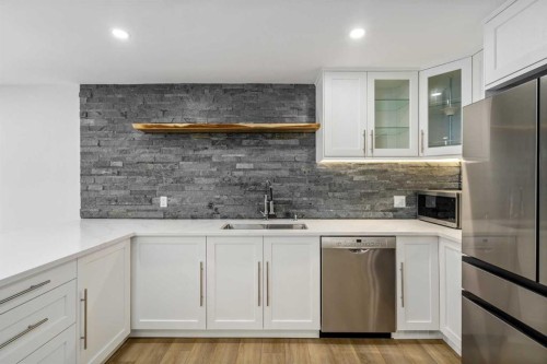 119 Silvercreek Close Nw, Calgary, AB - Indoor Photo Showing Kitchen With Upgraded Kitchen