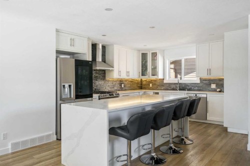 119 Silvercreek Close Nw, Calgary, AB - Indoor Photo Showing Kitchen With Upgraded Kitchen