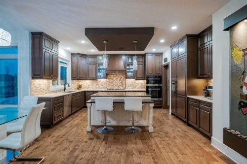 90 Silverado Ranch Way Sw, Calgary, AB - Indoor Photo Showing Kitchen With Upgraded Kitchen