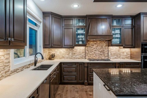 90 Silverado Ranch Way Sw, Calgary, AB - Indoor Photo Showing Kitchen With Double Sink With Upgraded Kitchen