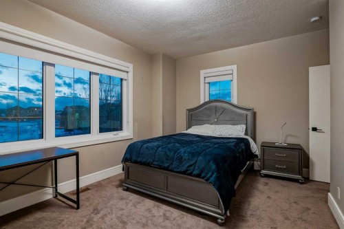 90 Silverado Ranch Way Sw, Calgary, AB - Indoor Photo Showing Bedroom