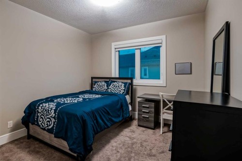 90 Silverado Ranch Way Sw, Calgary, AB - Indoor Photo Showing Bedroom