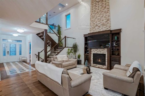 90 Silverado Ranch Way Sw, Calgary, AB - Indoor Photo Showing Living Room With Fireplace