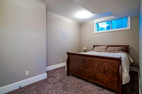 90 Silverado Ranch Way Sw, Calgary, AB - Indoor Photo Showing Bedroom