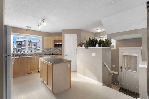440 Prestwick Circle Se, Calgary, AB - Indoor Photo Showing Kitchen With Double Sink