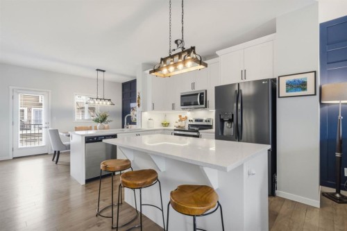 144 Legacy Point Se, Calgary, AB - Indoor Photo Showing Kitchen With Stainless Steel Kitchen With Upgraded Kitchen