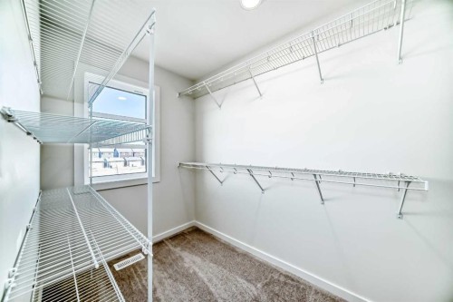 138 Lanark Gate Se, Airdrie, AB - Indoor With Storage
