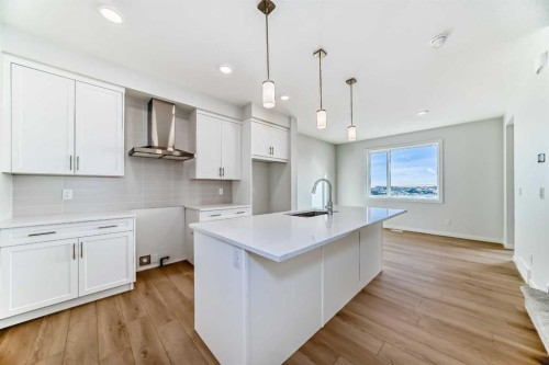 138 Lanark Gate Se, Airdrie, AB - Indoor Photo Showing Kitchen With Upgraded Kitchen