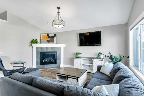 60 Auburn Glen Green Se, Calgary, AB - Indoor Photo Showing Living Room With Fireplace