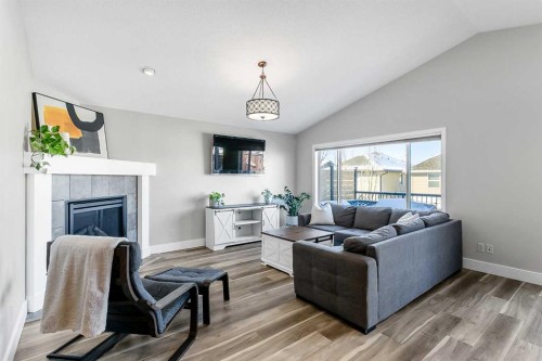 60 Auburn Glen Green Se, Calgary, AB - Indoor Photo Showing Living Room With Fireplace