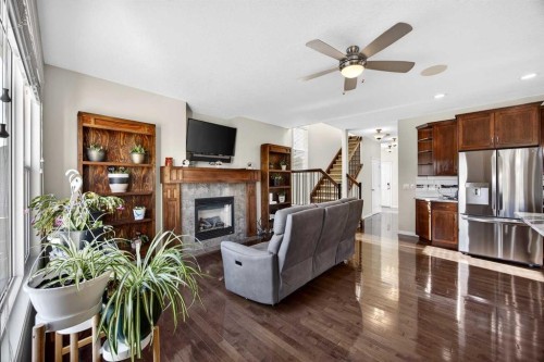 46 Heritage Landing, Cochrane, AB - Indoor With Fireplace