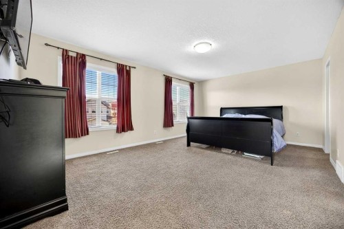 46 Heritage Landing, Cochrane, AB - Indoor Photo Showing Bedroom