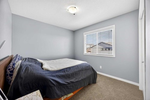 46 Heritage Landing, Cochrane, AB - Indoor Photo Showing Bedroom