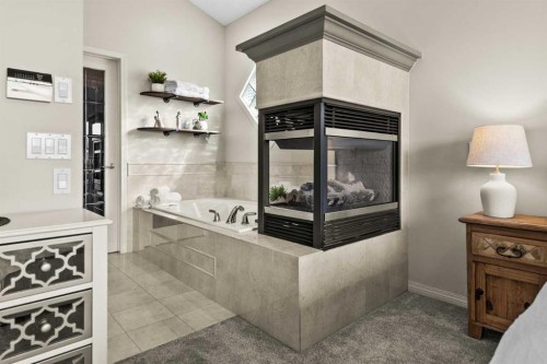 93 Cranwell Place Se, Calgary, AB - Indoor Photo Showing Other Room With Fireplace