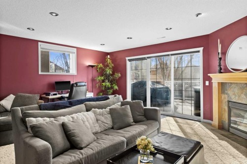 93 Cranwell Place Se, Calgary, AB - Indoor Photo Showing Living Room With Fireplace
