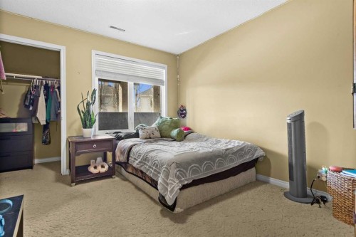 93 Cranwell Place Se, Calgary, AB - Indoor Photo Showing Bedroom