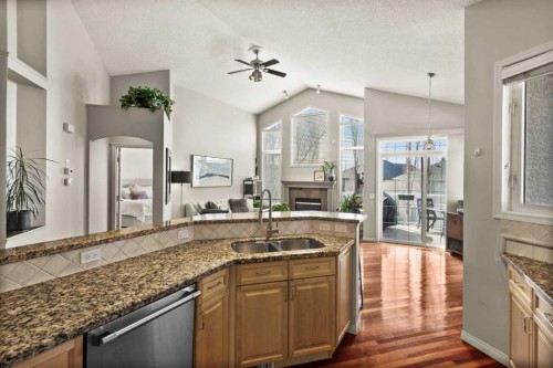 93 Cranwell Place Se, Calgary, AB - Indoor Photo Showing Kitchen With Double Sink