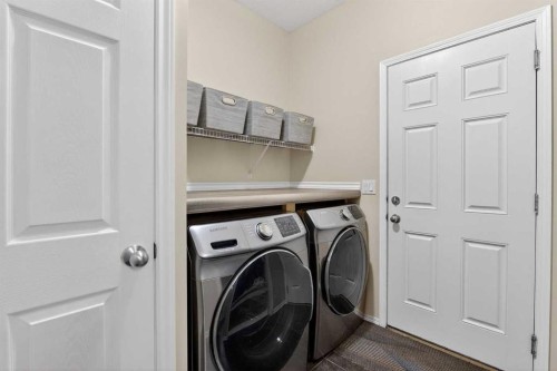 133 Cimarron Drive, Okotoks, AB - Indoor Photo Showing Laundry Room