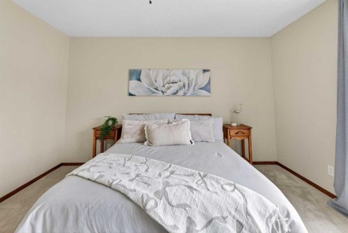 133 Cimarron Drive, Okotoks, AB - Indoor Photo Showing Bedroom