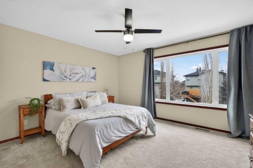 133 Cimarron Drive, Okotoks, AB - Indoor Photo Showing Bedroom