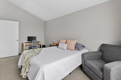 133 Cimarron Drive, Okotoks, AB - Indoor Photo Showing Bedroom