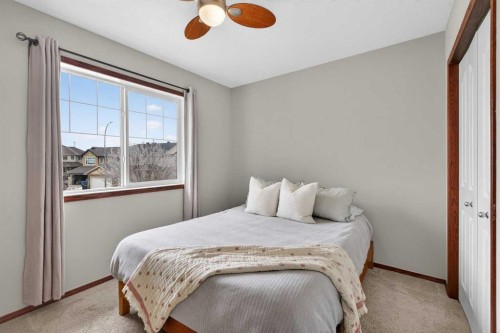 133 Cimarron Drive, Okotoks, AB - Indoor Photo Showing Bedroom
